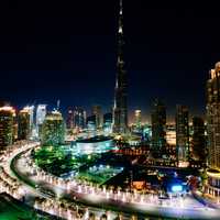 Dubai cityscape at night with Burj Khalifa in center in the United Arab Emirates - UAE