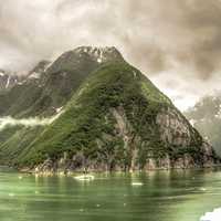 Black Clouds over rising hills in the Fjord around Juneau, Alaska