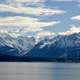 Scenic Mountains with snow over the water