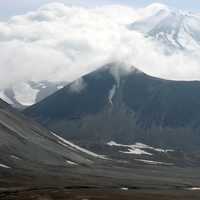 Mountain Landscape with clouds around the Peak