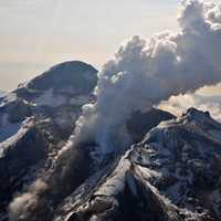 Crater with steam of redoubt Volcano in Lake Clark National Park, Alaska