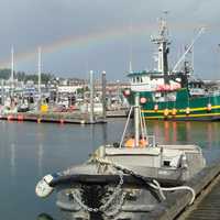 Kodiak Harbor, July 2009 with boats and a rainbow in Alaska