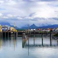 Town with Majestic Mountains in the Back in Alaska
