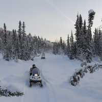 US Marines delivering toys for Tots on snowmobiles in McGrath, Alaska