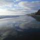 Black's Beach in California with clouds and water