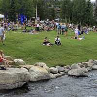 People sitting by the creek at Breckenridge, Colorado