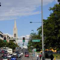 Colfax Avenue with traffic during the day in Denver, Colorado