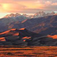 Alpenglow on Dunes and Crestone Peaks