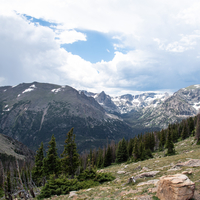 Heavy clouds over the tops of mountains