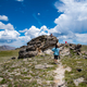 People climbing Rock Clump on the mountaintop