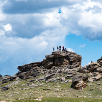 Puffy Clouds over the rocky clumps at rock cut