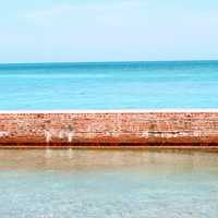 Moat wall against the ocean and the horizon