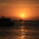 Sailing under the fading sun at Key West, Florida