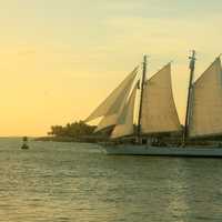Ships sailing into the sunset at Key West, Florida