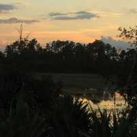 Sunset over lake at Sebastion River State Park, Florida
