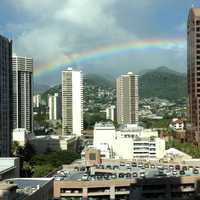Rainbow over city buildings in Honolulu, Hawaii