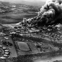 Curtiss P-40s burning at Wheeler, 7 December 1941 after attack on Pearl Harbor, Hawaii