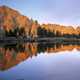 White Cloud peaks reflect into a small lake on the Windy  Devil Pass in the Sawtooth National Forest