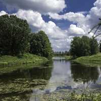 Landscape under clouds and skies in Chicago Botanical Gardens