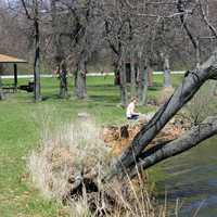 Fisherman on the shore at Sangchris lake State Park, Illinois