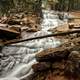 Wild Waterfall in the forest in Acadia National Park