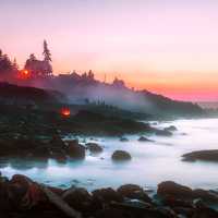 Ogunquit sunset over misty seashore in Maine