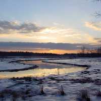 Sunrise above the winter and snow