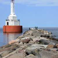 Lighthouse and people at McLain State Park, Michigan