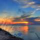 Red sunset over the lake at Pictured Rocks National Lakeshore, Michigan