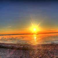 Sunrise over misty superior at Porcupine Mountains State Park, Michigan