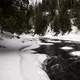 Flowing Cascade River in the winter at Cascade River State Park, Minnesota