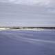 Horizon with snowy landscape and lake Superior at Gooseberry Falls State Park, Minnesota