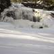 Rushing waterfalls in the snow and ice at Gooseberry Falls State Park, Minnesota