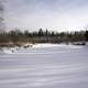 Snowy River Landscape with trees and sky at Gooseberry Falls State Park, Minnesota