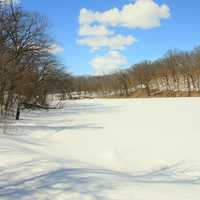 A small lake frozen at Lake Maria State Park, Minnesota