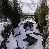 Scenery on the Temperance River flowing towards the bridge at Temperance River State Park, Minnesota