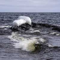 Waves and small ice island in Lake Superior at Temperance River State Park, Minnesota