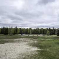 Parking lot landscape under cloudy skies, Zippel Bay State Park