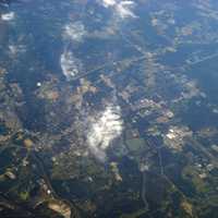 Aerial View with clouds and town underneath in Columbus, Mississippi