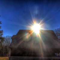 Sun over visitor's center at Babbler State Park, Missouri