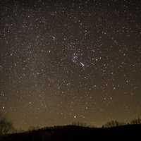 Lots of Stars night Sky with hills in Echo Bluff State Park, Missouri