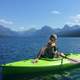 Girl Canoeing on Lake McDonald at Glacier National Park, Montana