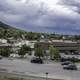 Cars and buildings under cloudy sky in Helena, Montana