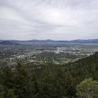 Far off Helena from Mount Ascension under grey skies in Helena