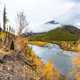 Autumn Stream with clouds covering the mountains