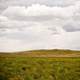 Landscape and mound with clouds in Montana