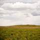 Landscape and mound with clouds in Montana