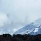 Snowy Mountain with clouds landscape in Montana