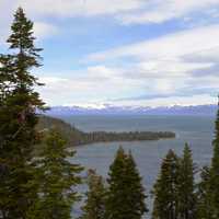 Landscape through the pine trees at Lake Tahoe in Emerald Bay