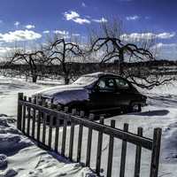 Car in the snow in New Hampshire